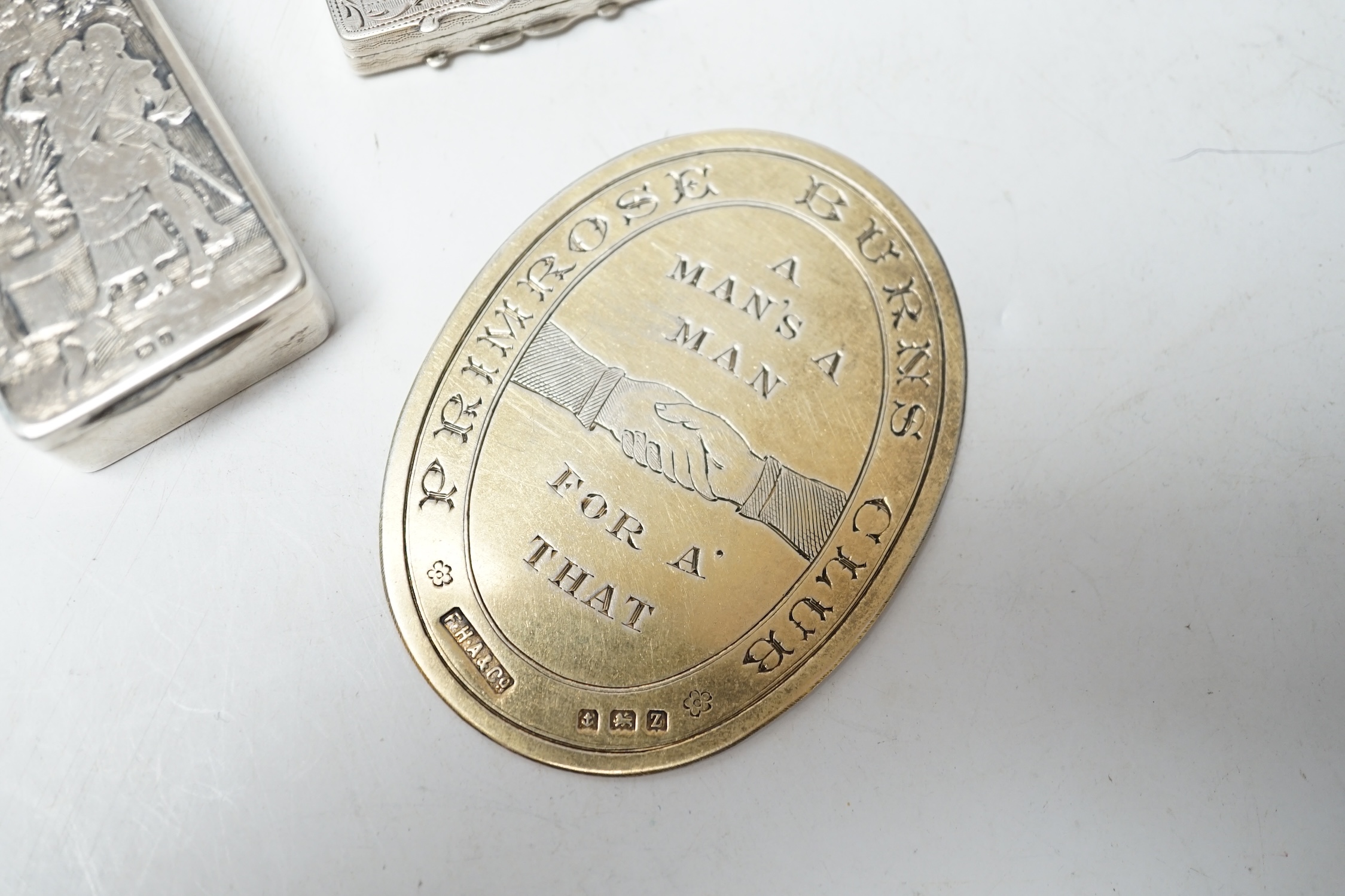 A Georgian Scottish silver vinaigrette, J. Hay, Edinburgh, circa 1820, 38mm(a.f.), together with a later silver snuff box and a silver presentation 'Primrose Burns Club' plaque. Condition - poor to fair